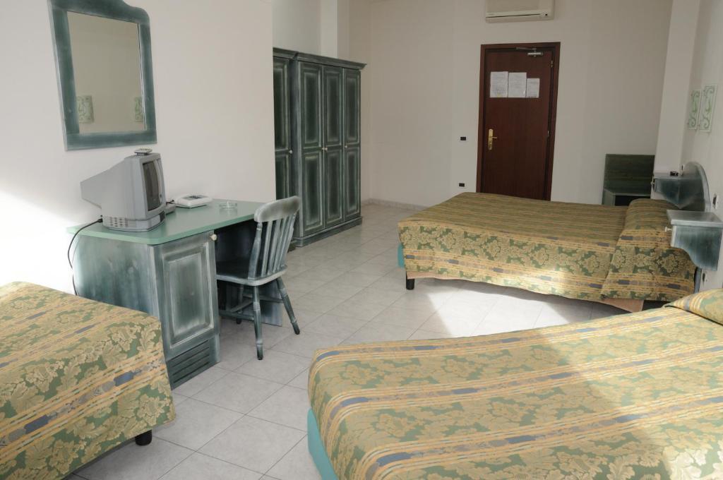 Hotel Meridiana Arbus Rum bild